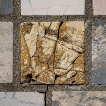 A fine-grained yellowish marble from Coimbra, Portugal, in the NIST Stine Test Wall