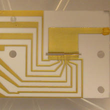 Photo of a gold ion trap