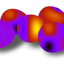Image of 5 egg-looking structures in purple, red, orange and yellow