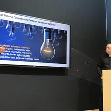 Kevin Stine and Mark Simos presenting at the Microsoft booth