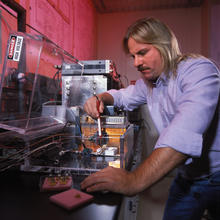 Man standing working on a silicon carbide device