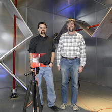 Two men in a reverb chamber