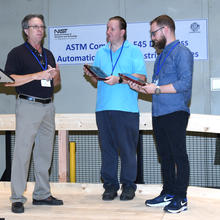 Adam Norton and Matt Lafary receive ASTM award of Appreciation with Roger Bostelman