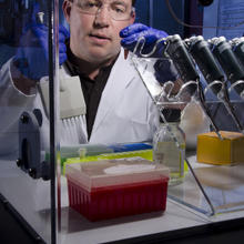 A man with a pipette