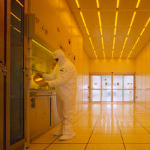 Man in a clean suit in the nanofab