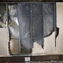 Steel wall with covering burned off