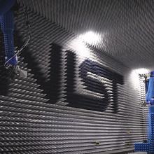 Photo of antenna lab with  NIST logo in the background