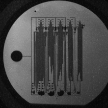 GadInk filled neutron transmission grating