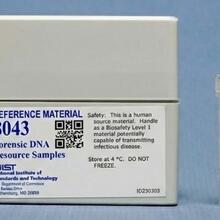 A white box with a small vial displayed next to it; the box is labeled Reference Material 8043 Forensic DNA Resource Samples. The vial says Sample 1. 