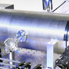 Combined acoustic resonator and optical cavity
