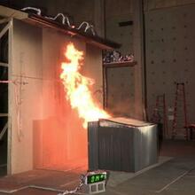 A steel closet shed at 1.5 m (5 ft) separation and containing 4 wood cribs burns and creates a fire plume contacting the target eaves.