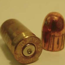 A fired cartridge case and a fired bullet.