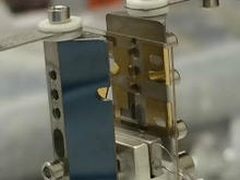 Image shows an ion trap assembly used in the aluminum-ion optical clock.