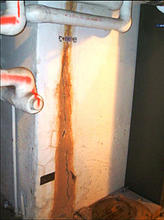 Photo of deteriorated pipe insulation in a NIST G'burg lab building