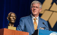 Photo of 2018 Baldrige Foundation E. David Spong Lifetime Achievement Awardee Larry Potterfield speaking at podium.