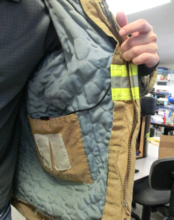 This photo shows a haptic protoype being incorporated into a firefighter's jacket