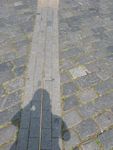 shadow of Judah Levine over longitude line in Prague