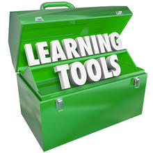 Green tool box with Learning Tools lettered in white