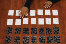 Picture showing metric cards laid out on brown table top