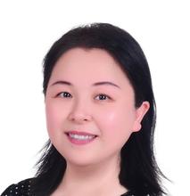 headshot of a woman with dark hair