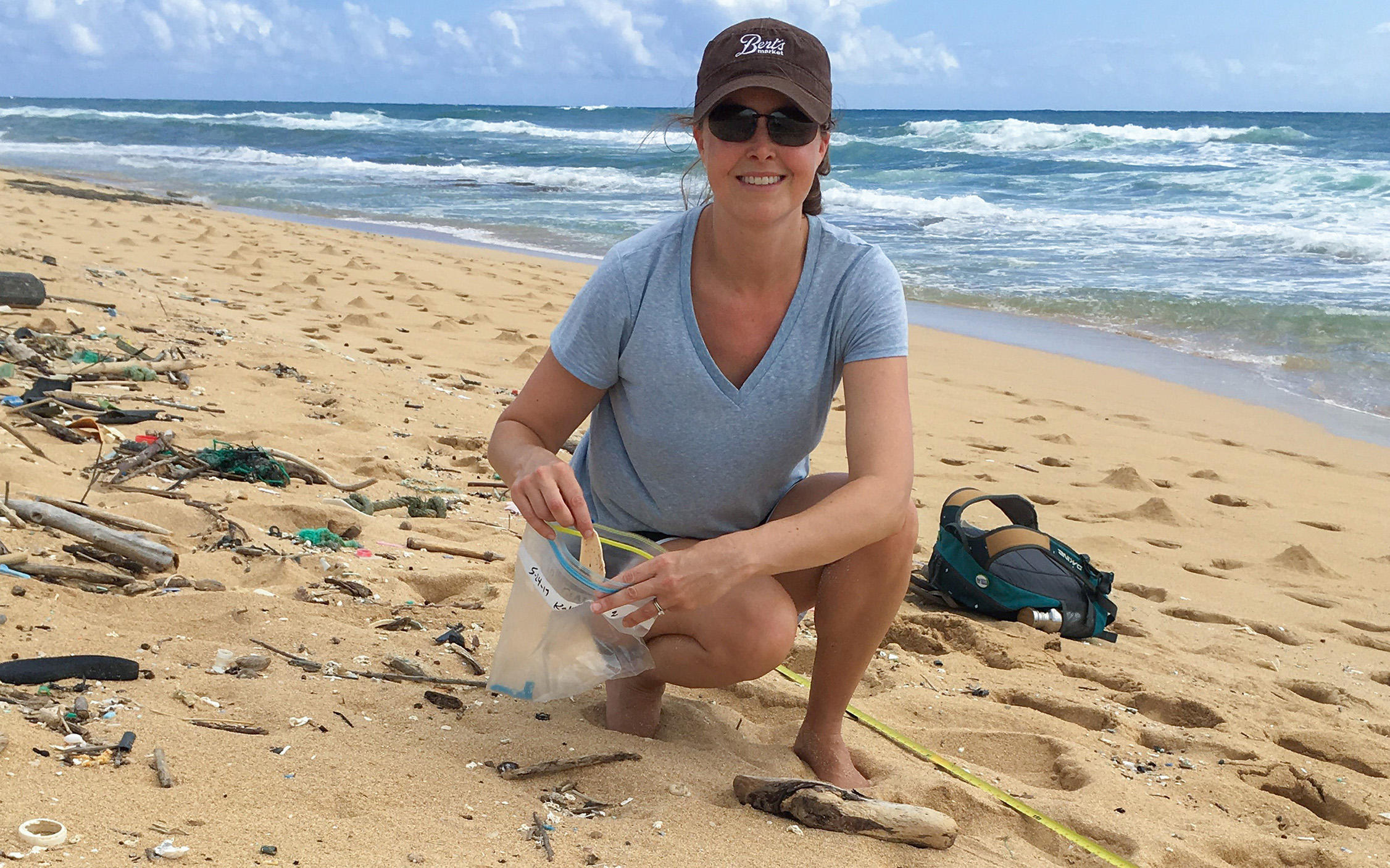 Plastic Water Bottles On The Beach Left By Tourists. Pollution In