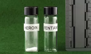 Two vials, one with heroin and one with an equivalent dose of fentanyl, which is a much smaller amount. 
