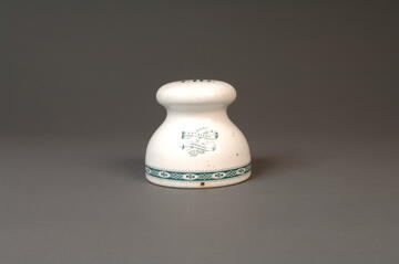 Front view of white and blue Earthenware Weight