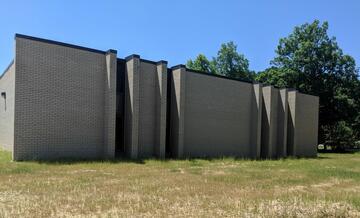 Outside view of windowless brick building