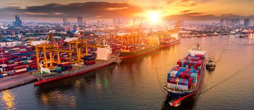 Logistics and transportation of Container Cargo ship and Cargo plane with working crane bridge in shipyard at sunset, logistic import export and transport industry background