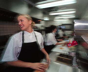 Pal's Sudden Service photo of employees making food.