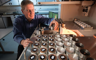 A photo of NIST researcher John Sieber in his lab.
