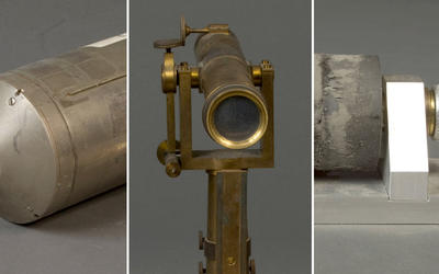 from left to right, a a metal cylinder, a telescope, and a device with rubber bushings on a spindle