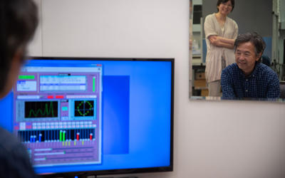 NIST researchers Yoshi Ohno and Jane Li demonstrate different types of lighting in their lab on NIST’s campus in Gaithersburg, Maryland.