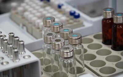 Custom trays hold different kinds of vials for laboratory work.