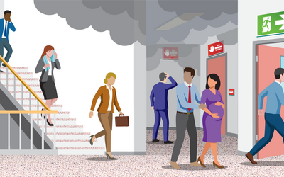 An illustration depicting office workers in a stairwell trying to take a safe exit, shown in green, during a fire emergency.