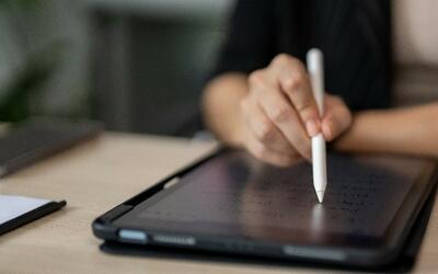 person with tablet