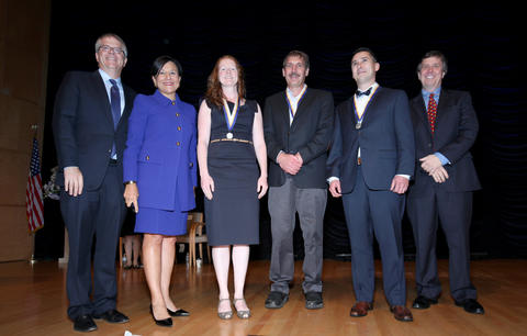 Secretary Pritzker and Deputy Secretary Andrews with the NIST Associate Director for Laboratory Programs, Kent Rochford and the NIST team members who received the DOC's inaugural Ron Brown Excellence in Innovation Award