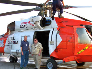 DJ Atkinson (right) with Coast Guard