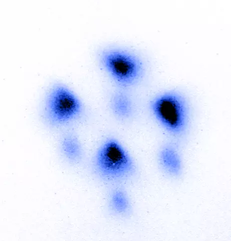 image 1 (of 3) showing strontium atoms forming a "cube"