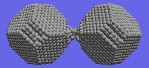 Computer simulations demonstrate the material extension and necking that occurs during the separation of crystalline silica nanoparticles.