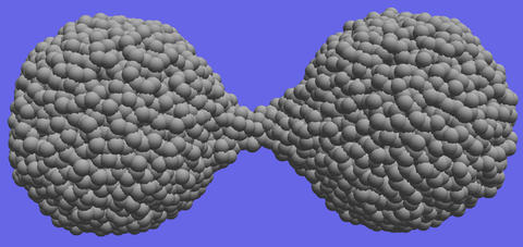 Computer simulations demonstrate the material extension and necking that occurs during the separation of amorphous silica nanoparticles.