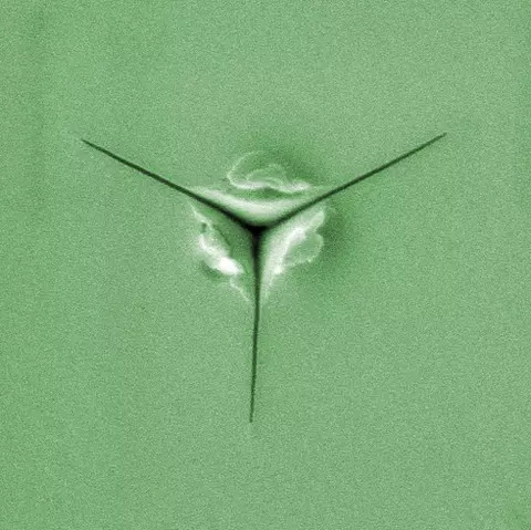 Typical low-k film test for material toughness using the new NIST technique. 