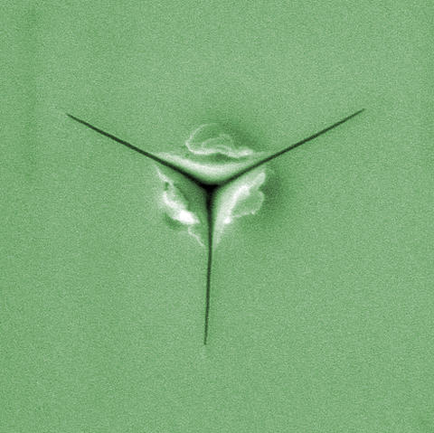 Typical low-k film test for material toughness using the new NIST technique. 