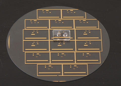 Close up photograph of the NIST micro microwave oven showing its two major components