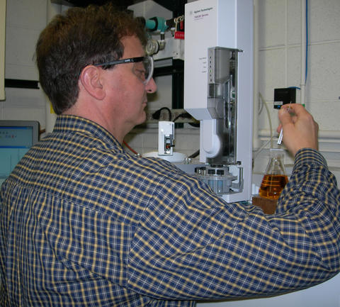 Candid portrait of Thomas Bruno using GC-MS on biofuel sample