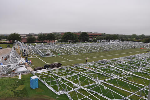 Overall view of the collapsed Dallas Cowboys practice facility after the fabric covering was removed.