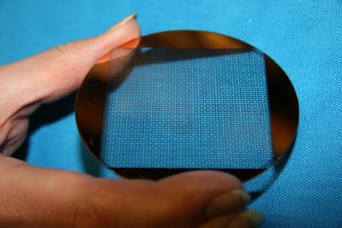 metafilms of both yttrium iron spheres embedded in a matrix, and tiny copper squares etched on a wafer.