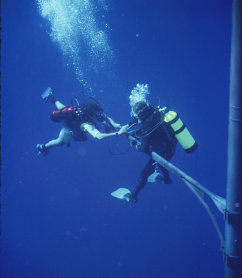 divers at work on an arm of MOBY