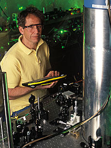 NIST physicist Jim Bergquist with the mercury ion clock