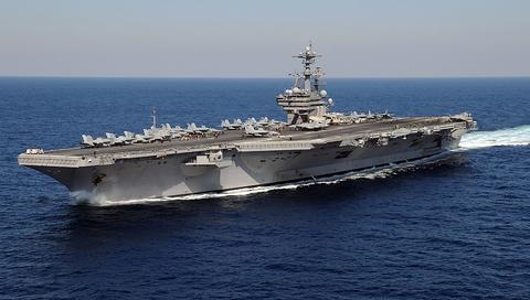 USS George H.W. Bush equipped with air traffic control radar system operating in the 3.5 GHz band.  Credit: U.S. Navy photo by Mass Communication Specialist 3rd Class Nicholas Hall [Public domain], via Wikimedia Commons